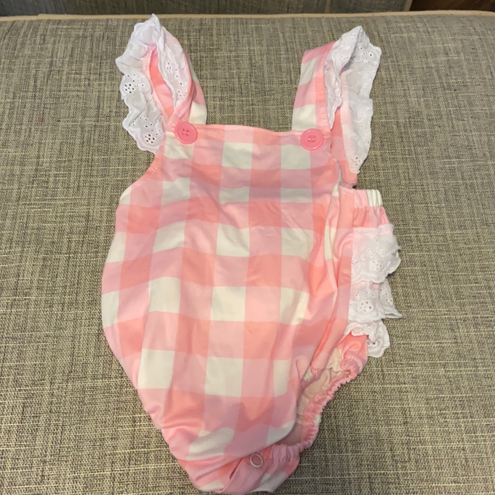 Pink gingham and white lace bathing suit